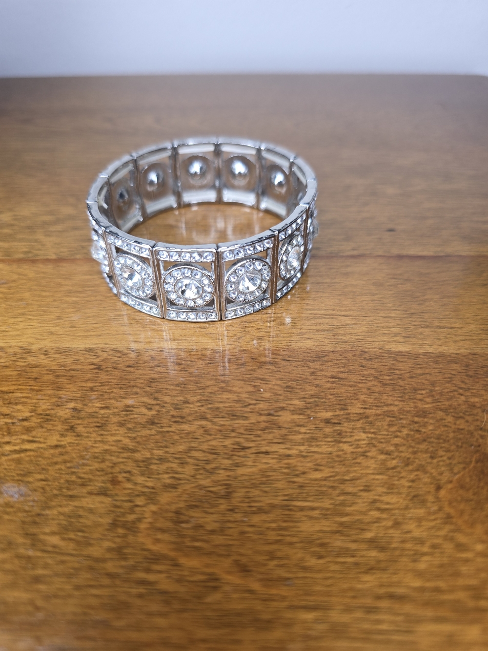 Sparkling Silvertone Rhinestone Encrusted Round Medallion Stretch Panel Bracelet